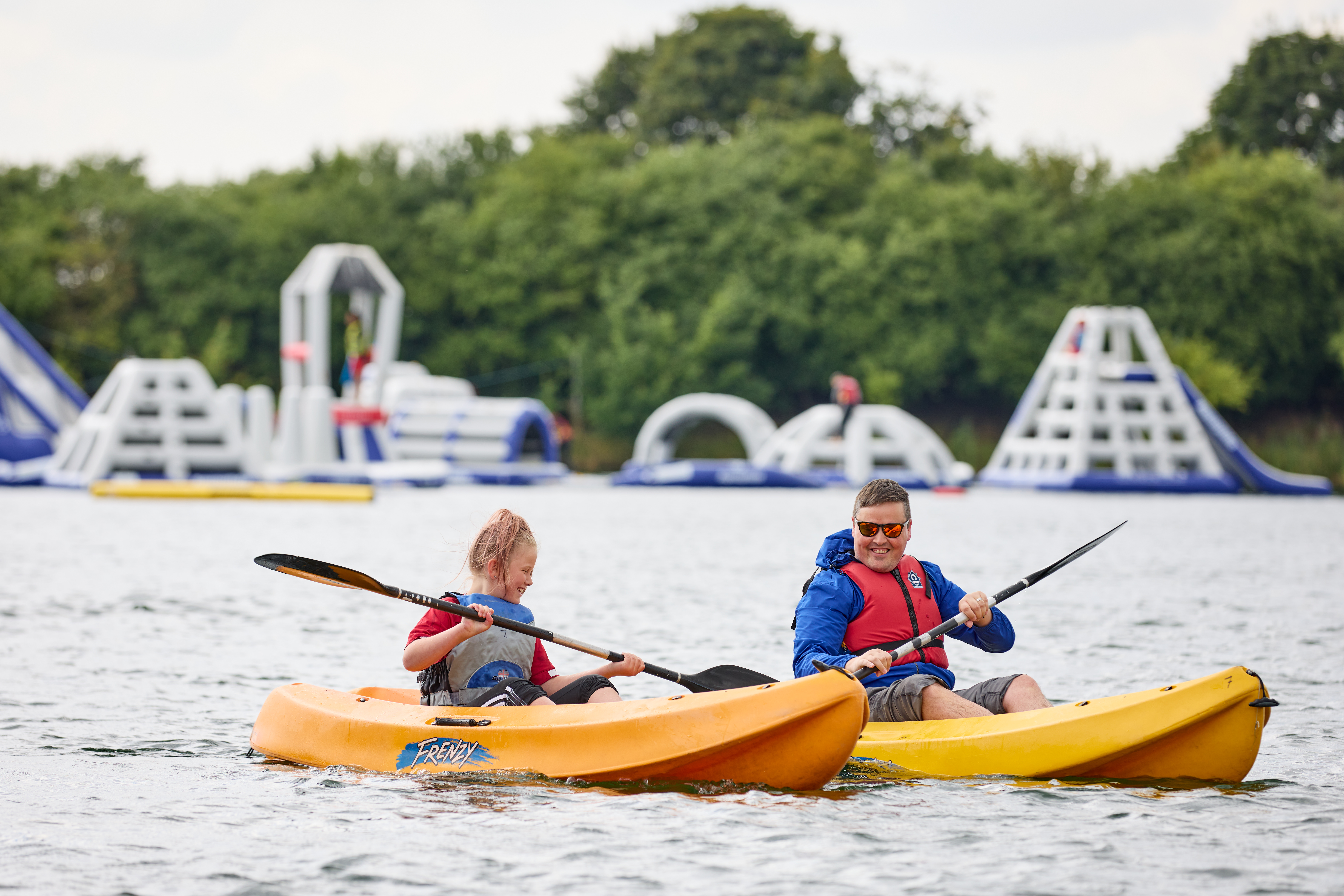 Hatfield Outdoor Activity Centre Aquapark two people swimming